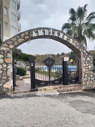 a gate to the entrance to the entrance to the beach at Antalya Ambiance Sitesinde in Antalya