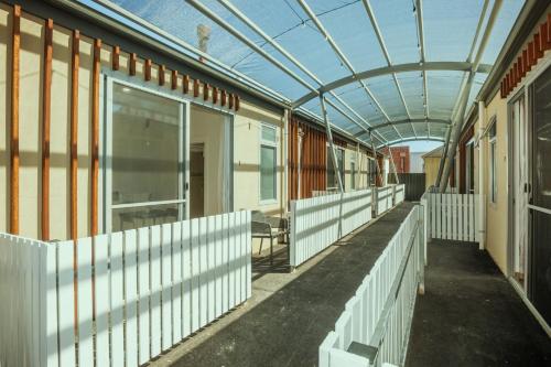 an empty building with a glass roof over a walkway at Stellar Residence #6 in Adelaide