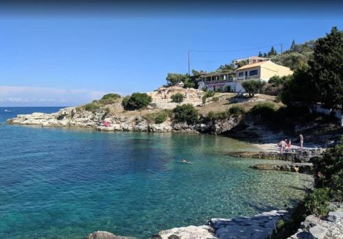 a group of people swimming in a body of water at Live the Summer Dream at Gaios Cozy Retreat in Gaios