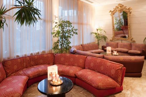 Zona de estar de Reginna Palace Hotel