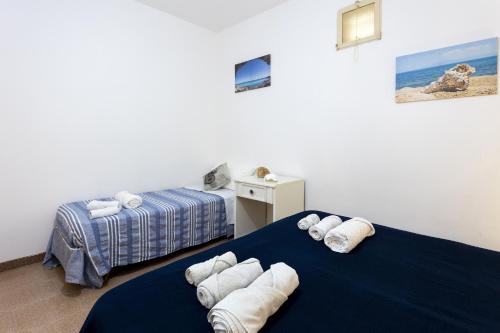 Postel nebo postele na pokoji v ubytování Mare e relax