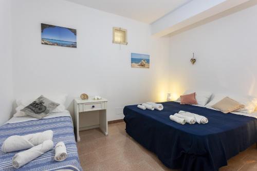 Postel nebo postele na pokoji v ubytování Mare e relax