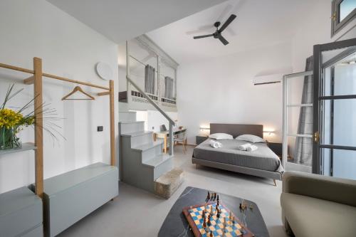 Postel nebo postele na pokoji v ubytování Hotel Nefeli