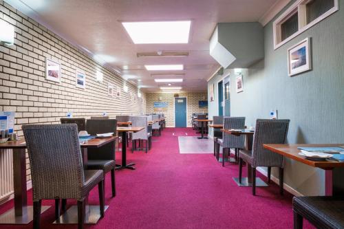 Ресторан / где поесть в Sandcliff Guest House