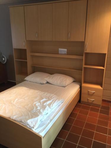 Ένα ή περισσότερα κρεβάτια σε δωμάτιο στο Apartment Acacia 105