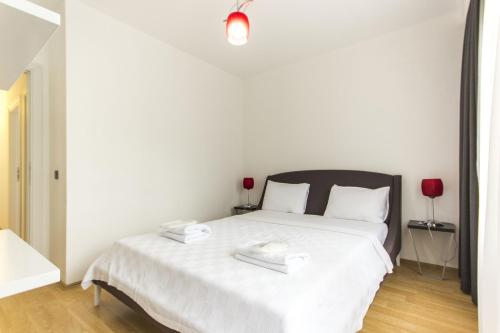 Postel nebo postele na pokoji v ubytování Nish Suites Atasehir
