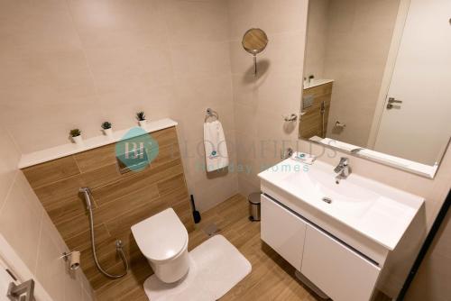 Koupelna v ubytování Iconic Duplex Apartment In Raha