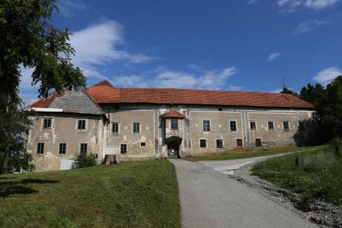 a large stone building with a red roof at Luxury Vineyard Retreat Matej - Happy Rentals in Trebnje