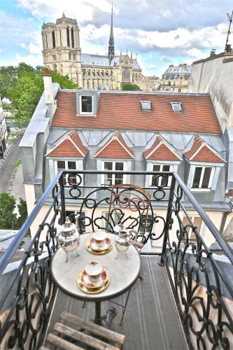 A Balcony on Notre Dame with AC