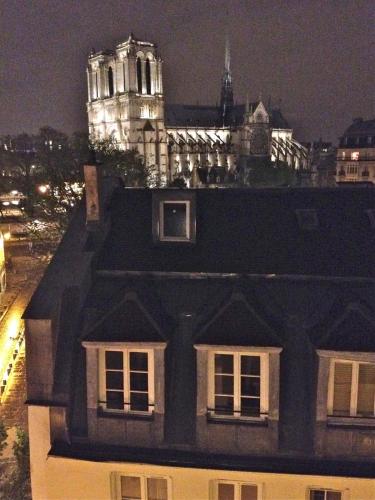 A Balcony on Notre Dame with AC