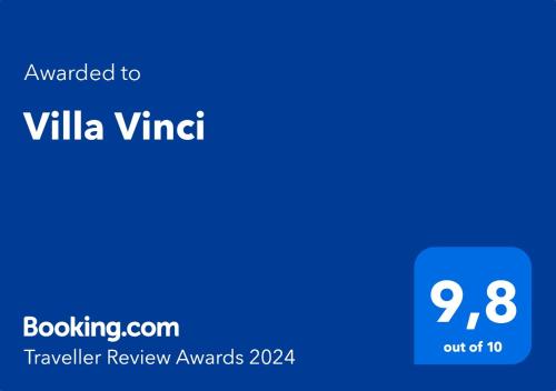 a blue square with the text awarded to villa vinifer review awards at Villa Vinci in Menfi