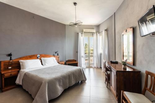 Postel nebo postele na pokoji v ubytování B&B La terrazza sul mare