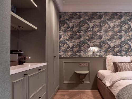 Кровать или кровати в номере Good Seasons Hotel Den Bosch