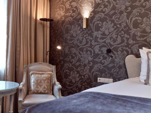 Кровать или кровати в номере Good Seasons Hotel Den Bosch