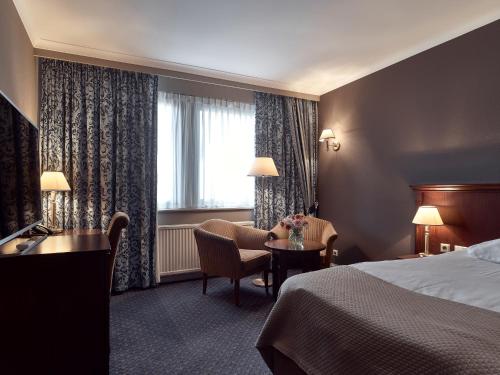 Кровать или кровати в номере Good Seasons Hotel Den Bosch