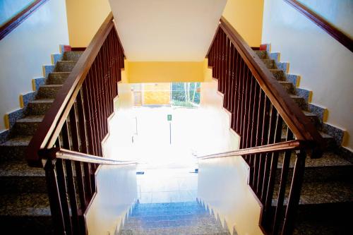 a view of a stairway with a stair case at Kigali Village Suites in Kigali