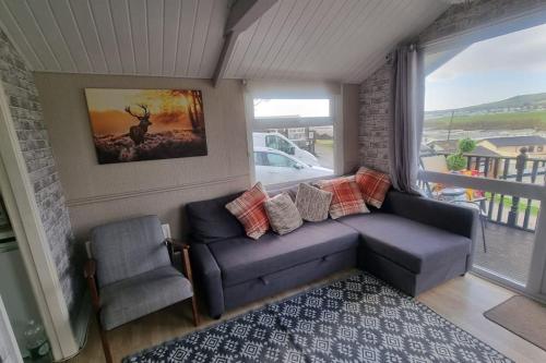 Χώρος καθιστικού στο No. 4 Sunny Lodge By The Sea