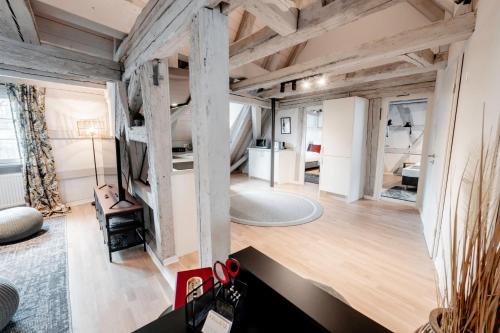 Ένα ή περισσότερα κρεβάτια σε δωμάτιο στο Cozy Schwabach #Dachterasse#Exquisit#Fachwerk#90qm