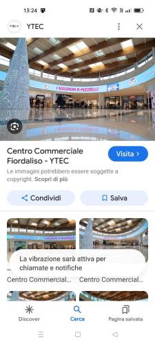 a screenshot of a webpage of a shopping mall at Curiel in Rozzano