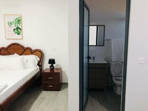 Postel nebo postele na pokoji v ubytování COSEC Tours