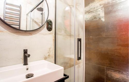 a bathroom with a sink and a shower at 1 Bedroom Gorgeous Home In Rowy in Rowy