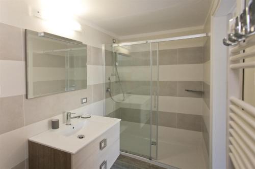 a bathroom with a sink and a shower at Residence Delle Rose in Tremosine Sul Garda