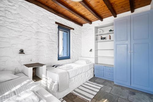 Ένα ή περισσότερα κρεβάτια σε δωμάτιο στο Diasella 1