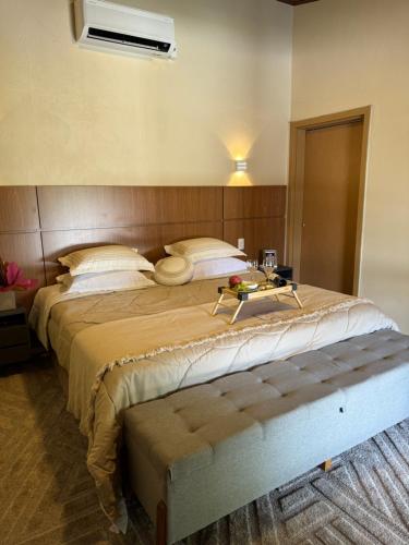 Postel nebo postele na pokoji v ubytování Chalé Villa Odara