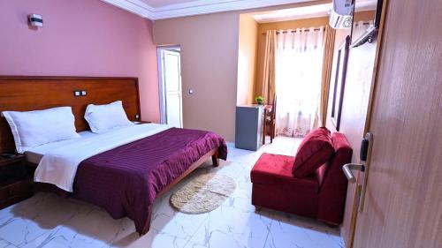 Letto o letti in una camera di ALICIA HOTEL
