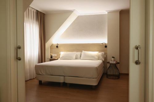 Ένα ή περισσότερα κρεβάτια σε δωμάτιο στο Hotel Maruxia *** Superior