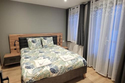 Säng eller sängar i ett rum på Superbe appartement T2 climatisé, idéalement situé