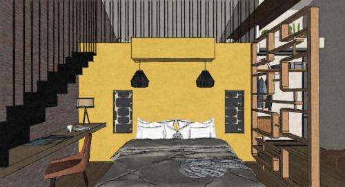 Dormitorio amarillo con cama y escalera en Maison arcades suite 1, en Verdun-sur-Garonne