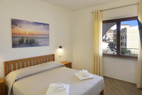 Katil atau katil-katil dalam bilik di Casa via Pascoli