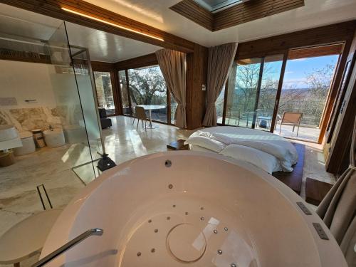 A bed or beds in a room at EcoResort Il Cantico della Natura