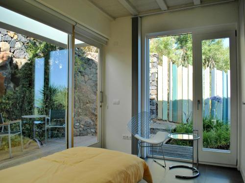 En eller flere senge i et værelse på Villa Ermita