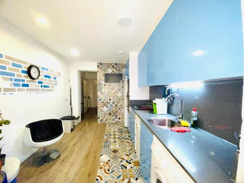Η κουζίνα ή μικρή κουζίνα στο Apartamento delux ll
