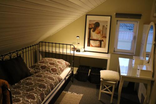 Säng eller sängar i ett rum på Ferienwohnung Mandelblüte