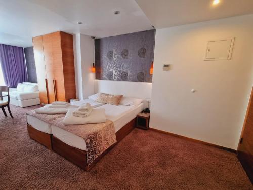Un ou plusieurs lits dans un hébergement de l'établissement Hotel Gala Split