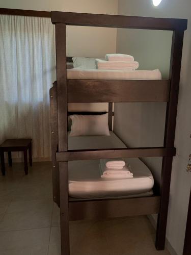 a group of bunk beds in a room at Hotel Il Castello in Villa Concepción