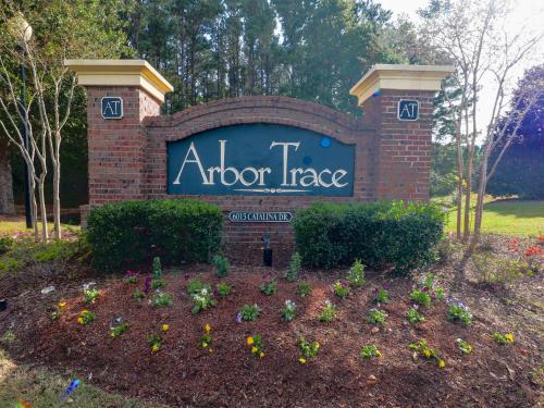 a sign for a indoor maze in a garden at Arbor Trace #811 condo in North Myrtle Beach