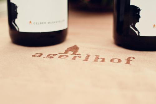 two bottles of wine sitting on top of a table at Winzerhof Agerlhof in Jois