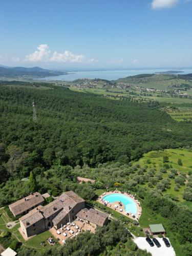 an aerial view of a resort with a swimming pool at EcoResort Il Cantico della Natura in Magione