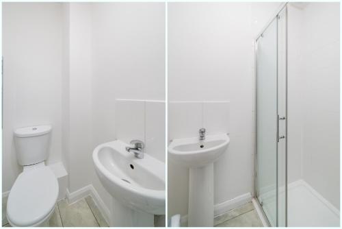 ein weißes Bad mit einem WC und einem Waschbecken in der Unterkunft Heart of Dalston- Trendy Compact Studio Flat in London