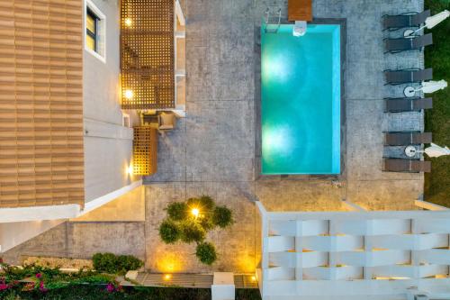 an overhead view of a swimming pool in a building at Valeria Private Villa in Plános