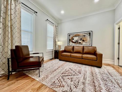 a living room with a couch and a chair at Luxury Home Incredible master suite Liberty Twp OH in Middletown