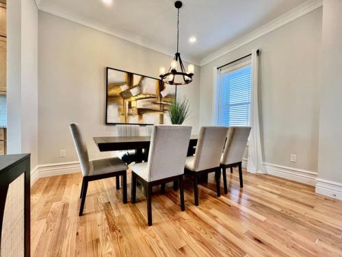 a dining room with a table and chairs at Luxury Home Incredible master suite Liberty Twp OH in Middletown