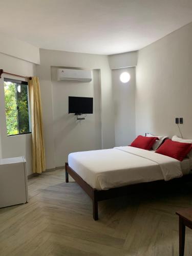 Postel nebo postele na pokoji v ubytování Hotel Il Castello