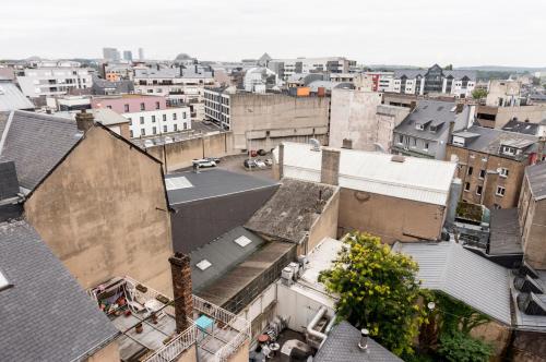 an aerial view of a city with buildings at The Queen Luxury Apartments - Villa Marilyn in Luxembourg