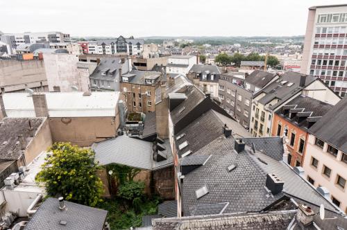 an aerial view of a city with buildings at The Queen Luxury Apartments - Villa Marilyn in Luxembourg