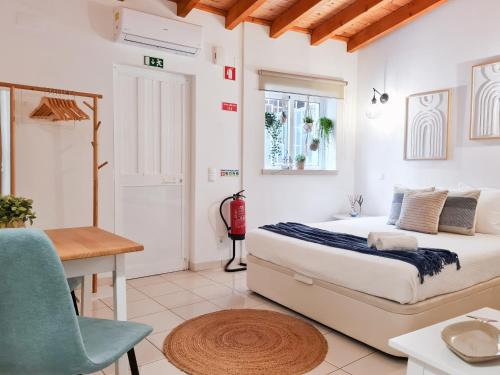 Foto MINHA CASA SUA CASA - Cozy Little House, AC & WiFi 2